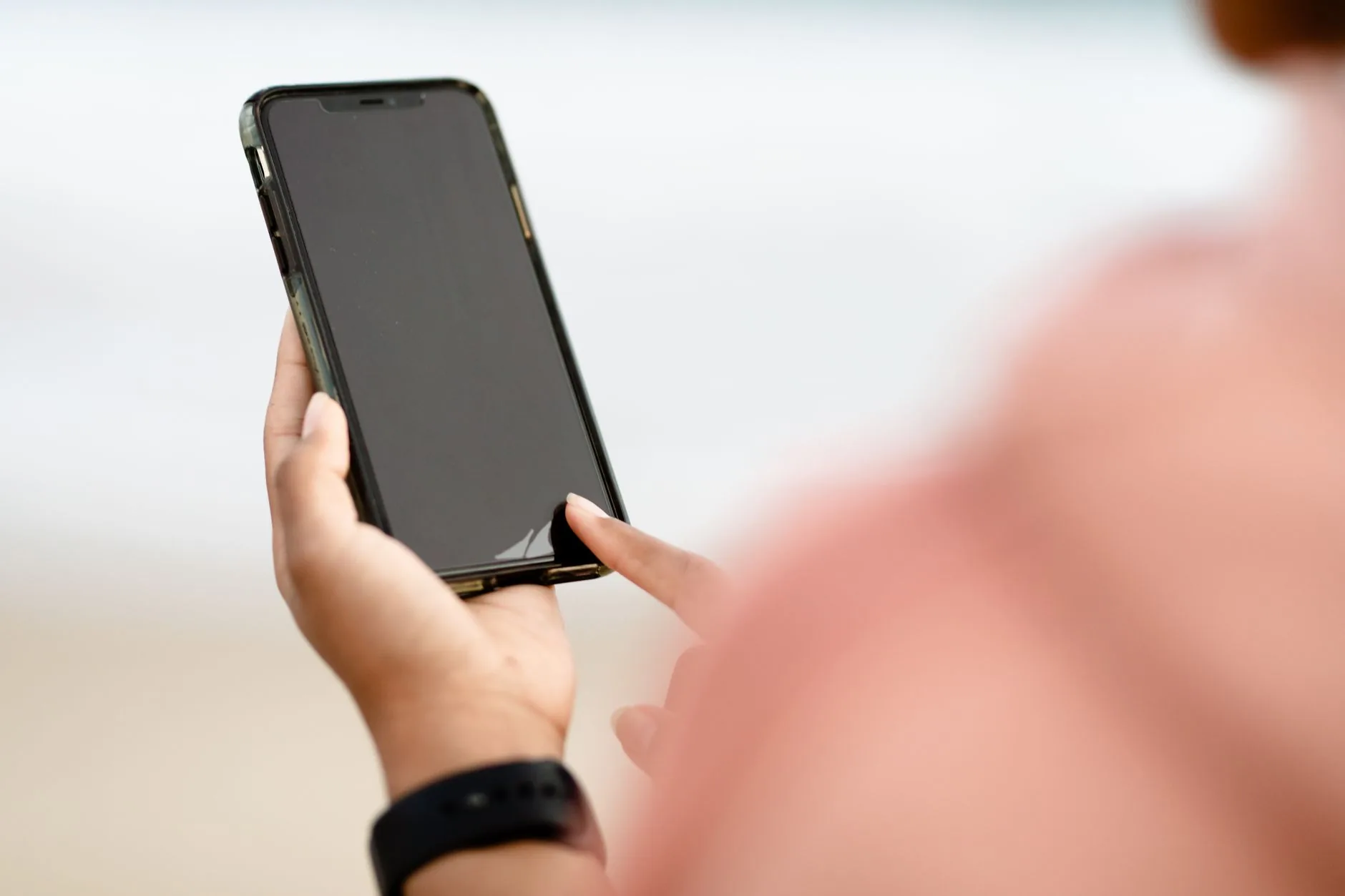 Runner in motion, smartwatch displaying app interface, muted colors, soft light.